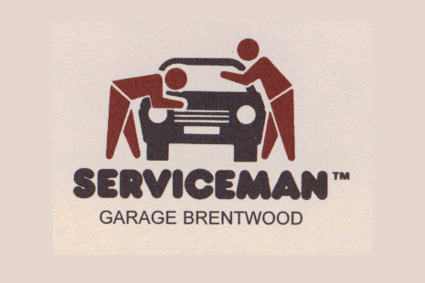 Logo for SERVICEMAN GARAGE BRENTWOOD, with a graphic showing two people and a car.  Dark and light brown text and image.