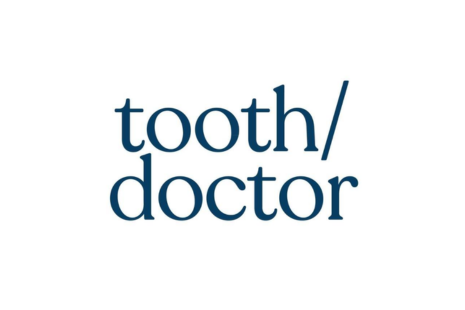 Logo for tooth/doctor in blue text on a white background.