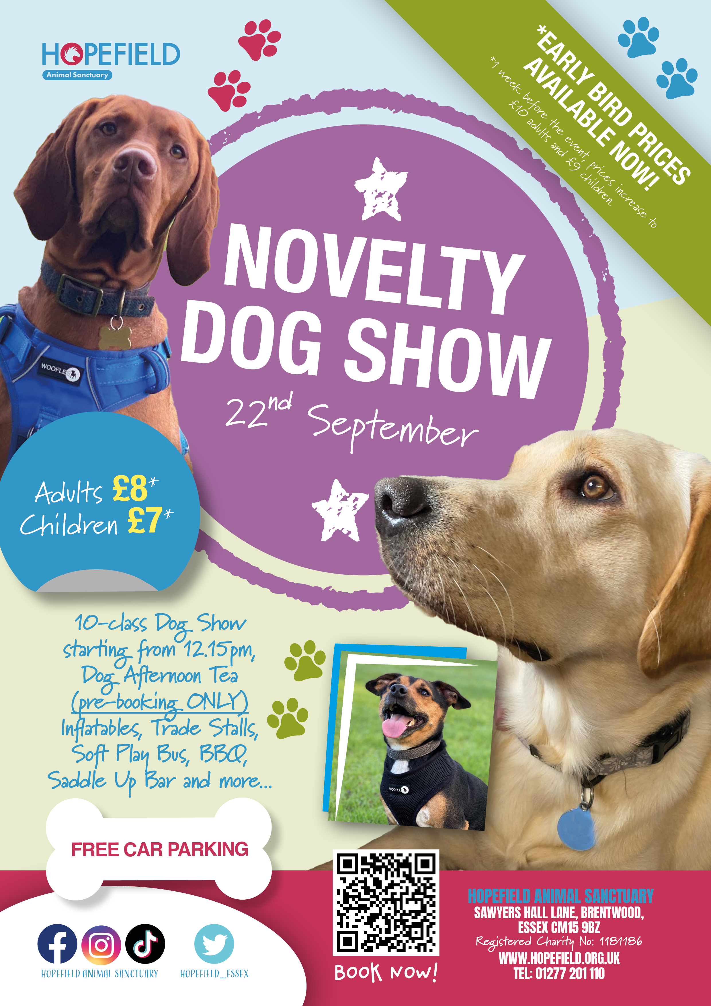 Poster for the 'Hopefield Novelty Dog Show' taking place on 22nd September. The background is light blue and green, featuring the Hopefield Animal Sanctuary logo at the top. Large white text in a purple circle announces 'Novelty Dog Show.' Red and blue paw prints decorate the poster. Early bird prices are highlighted in a green banner at the top right, with adults at £8 and children at £7. A large photo of a brown dog wearing a blue harness is on the left, and a smaller image of a light-coloured Labrador