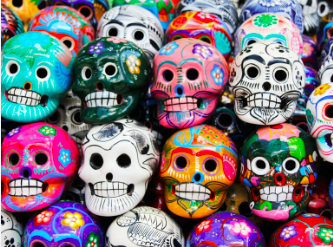 An image showing several colourful sugar skulls