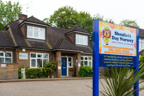 Image of Shenfield Day Nursery, a converted house on Hutton Road, Shenfield.  A sign with a lion reading 'Shenfield Day Nursery' is visible outside.