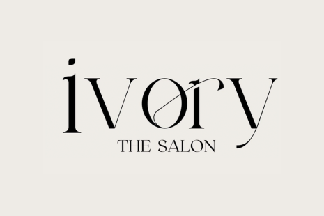 Logo for Ivory The Salon in black text on a cream background.