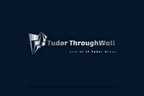 Logo for Tudor Throughwall with silver text on a black background.