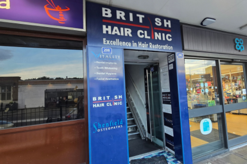 Image showing the exterior of 208 Hutton Road in Shenfield, with blue signage for the British Hair Clinic, Vitality Dental Spa and Shenfield Osteopaths.  The Co-Op is to the right of the entrance to 208 Hutton Road.