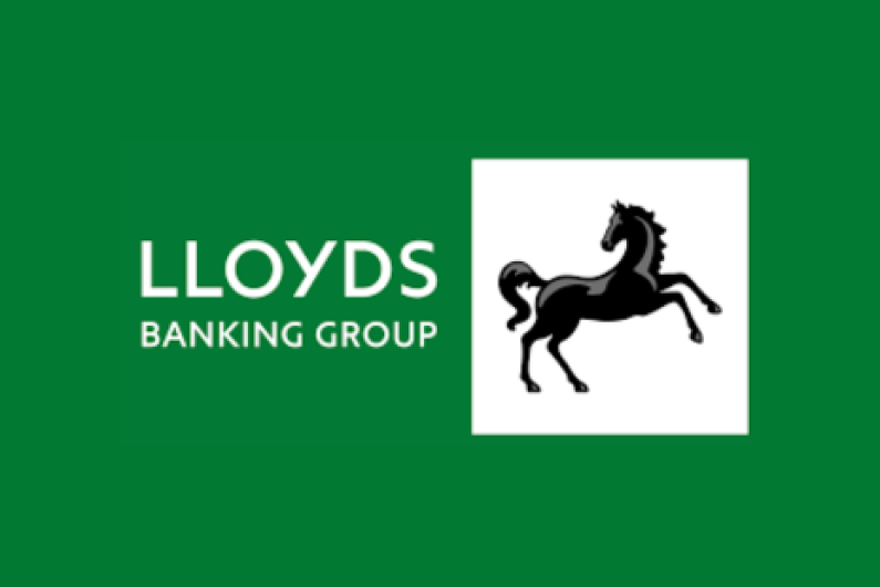 Logo for LLOYDS BANKING GROUP with white text on a green background, and an image of a black horse.