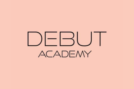 Logo for DEBUT ACADEMY with black text on a peach coloured background.