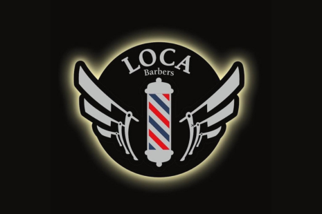 Logo for LOCA Barbers, showing a red, blue and white barber's pole in the centre surrounded by straight razors on either side.