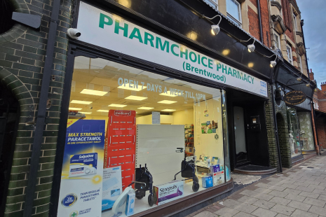 Image showing the exterior of Pharmchoice Pharmacy in Brentwood with a white sign and green text.