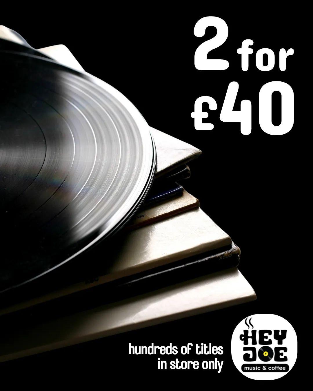 Black and white image showing a vinyl record on top of some covers, with white text reading '2 for £40'.  The Hey Joe Music & Coffee logo is on the bottom right corner, along with the words 'hundreds of titles.  In store only'.